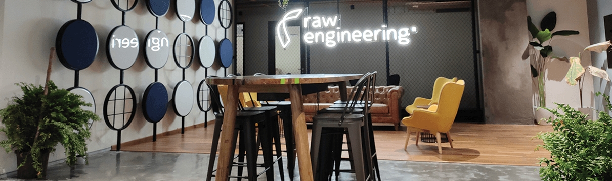 Image of Raw Engineering office with Raw Engineering neon light